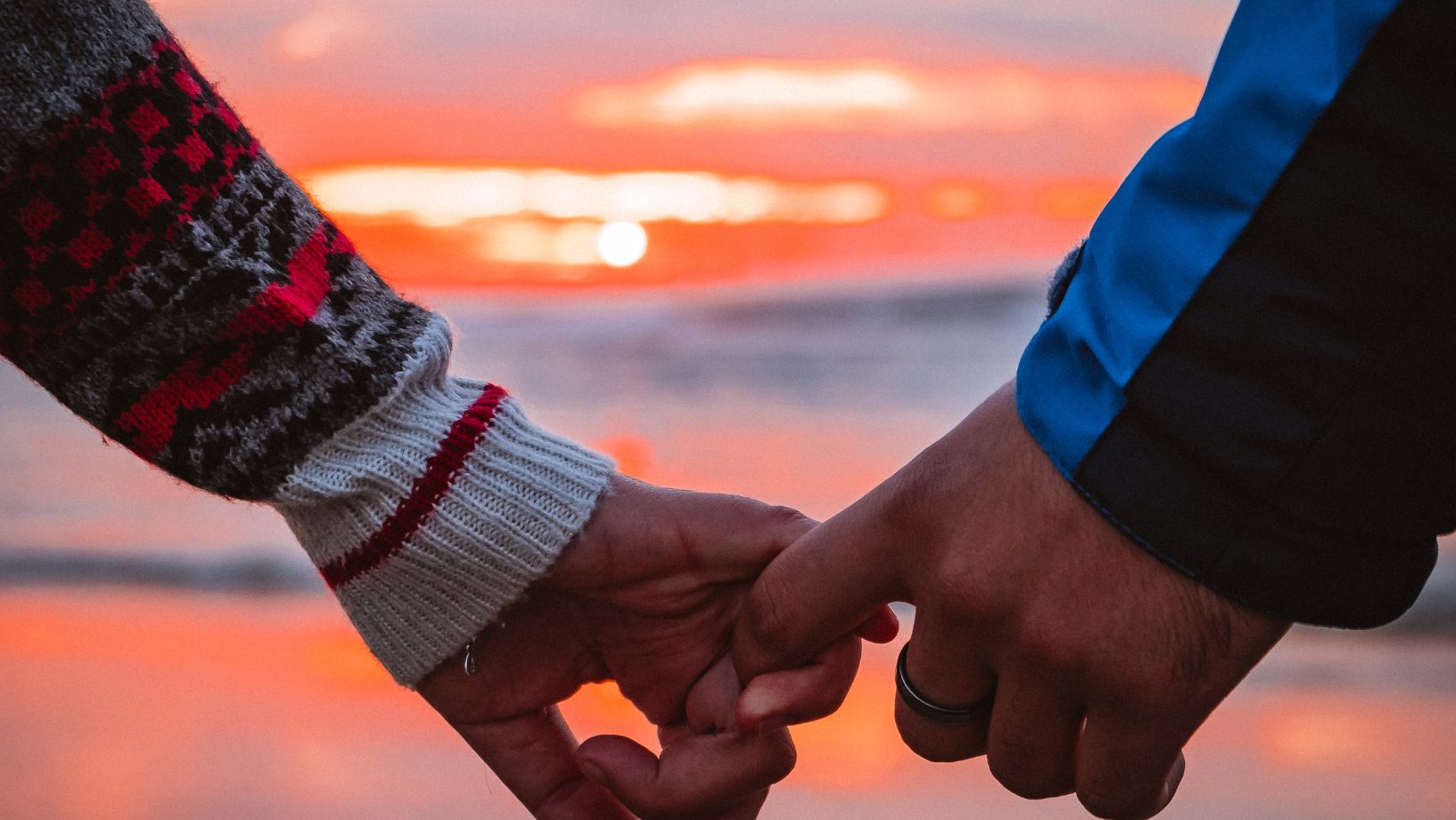 couple holding hands base